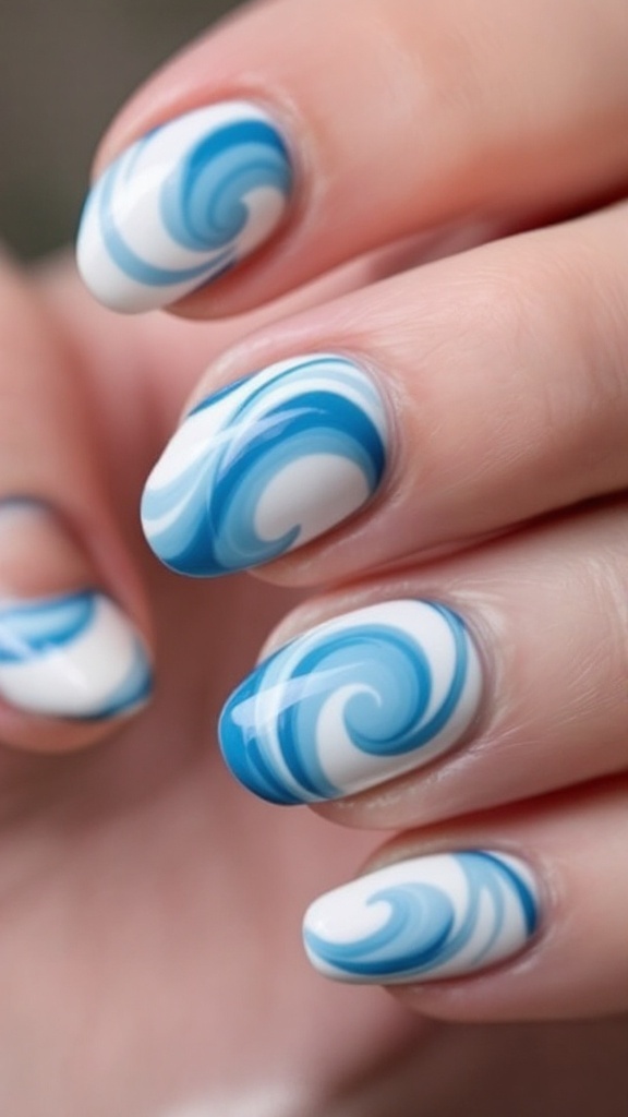 A close-up of powder blue nails with white swirl designs.