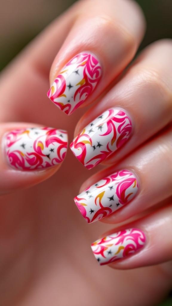 Nail art inspired by dragon fruit featuring pink and white designs with black speckles.